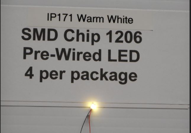 IP171  4 warm white 3v SMD 1206 chips by Iron Penguin